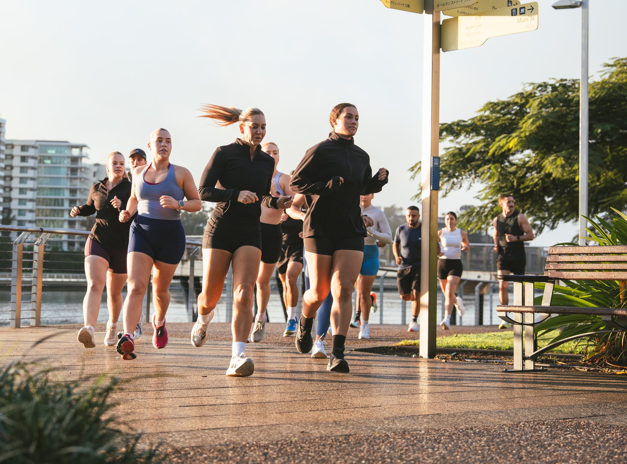 INTNT athletes training along the Brisbane river at sunrise